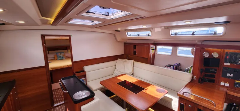 Avalon Sunset Yacht Photos Pics Interior of 2016 Hanse 505 yacht with elegant seating and wooden finishes.