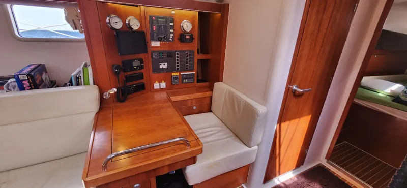 Avalon Sunset Yacht Photos Pics 2016 Hanse 505 yacht interior with navigation station and seating area.