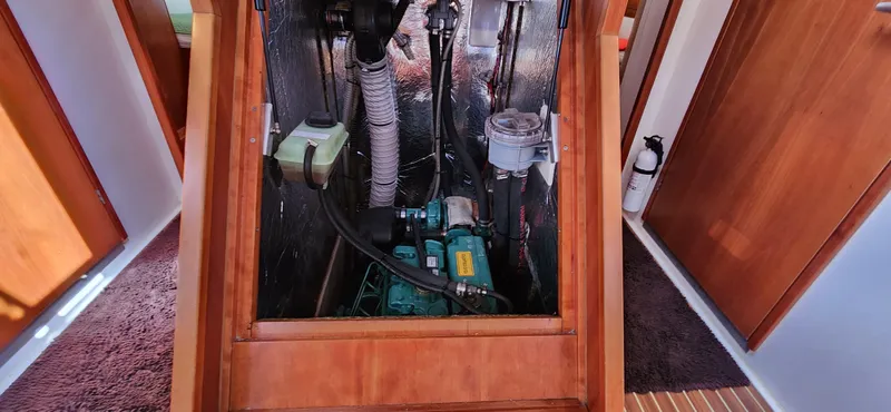 Avalon Sunset Yacht Photos Pics Engine compartment of a 2016 Hanse 505 yacht, showcasing mechanical components.