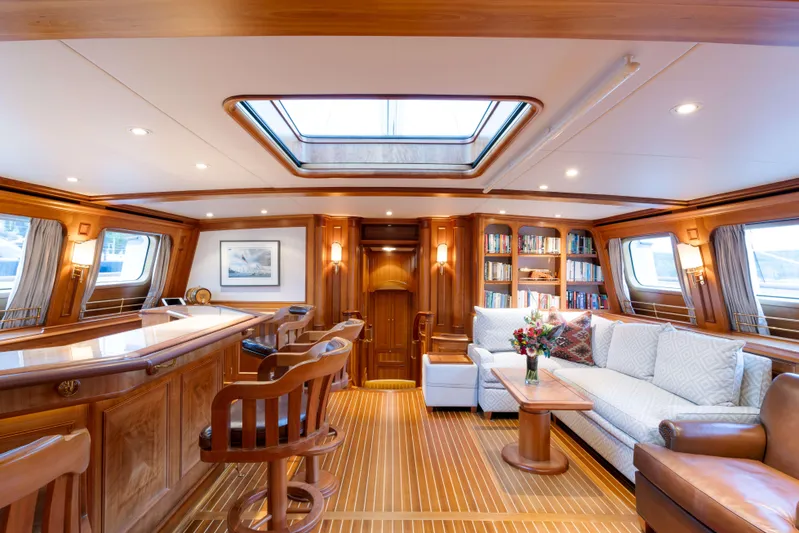 Catalina Yacht Photos Pics Luxurious interior of 2001 Vitters Cruising Ketch with elegant wood finishes and skylight.