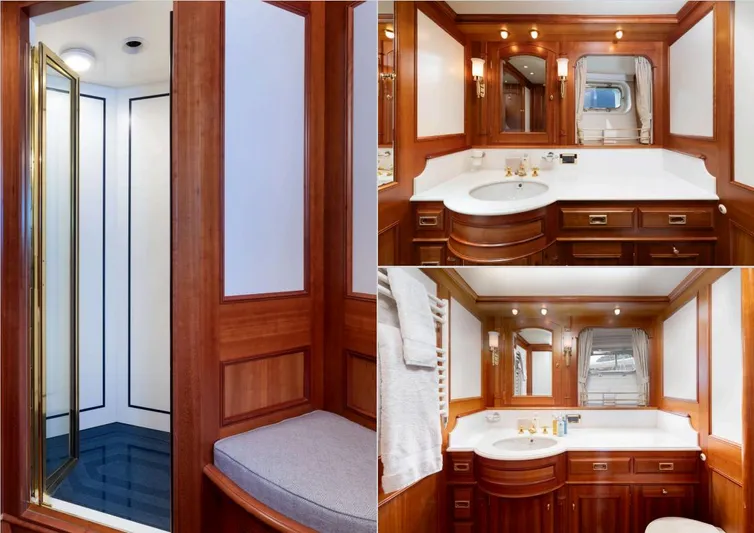 Catalina Yacht Photos Pics Luxurious 2001 Vitters Cruising Ketch bathroom with elegant wood finishes and modern amenities.