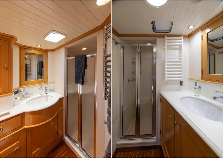 Catalina Yacht Photos Pics Luxurious bathroom in 2001 Vitters Cruising Ketch, featuring wood cabinetry and modern fixtures.