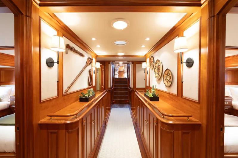 Catalina Yacht Photos Pics Luxurious wooden interior of 2001 Vitters Cruising Ketch yacht, featuring elegant hallway decor.