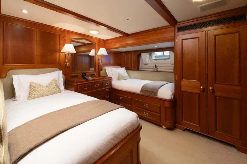 Catalina Yacht Photos Pics Luxurious wooden cabin interior of 2001 Vitters Cruising Ketch yacht with twin beds.