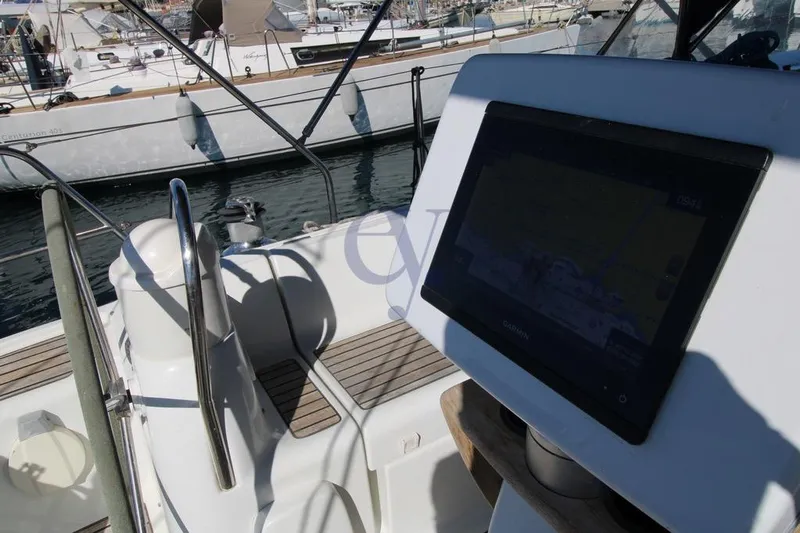  Yacht Photos Pics Cockpit view of 2004 Jeanneau Sun Odyssey 40.3 sailboat with navigation display.