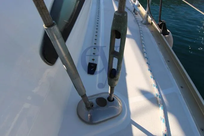  Yacht Photos Pics Deck view of 2004 Jeanneau Sun Odyssey 40.3 sailboat with rigging details.