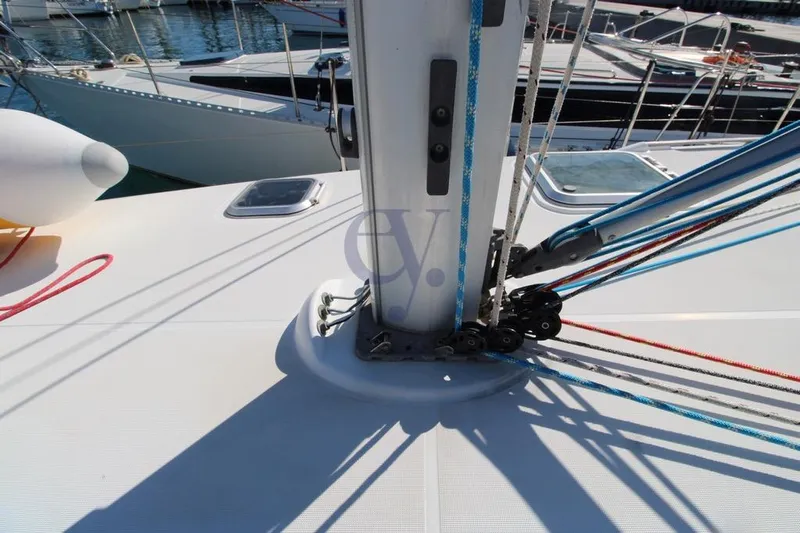  Yacht Photos Pics Deck view of 2004 Jeanneau Sun Odyssey 40.3 sailboat with rigging and ropes.