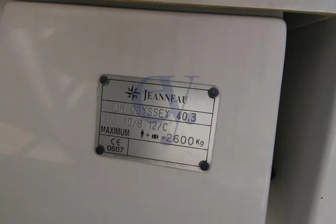  Yacht Photos Pics Plaque on Jeanneau Sun Odyssey 40.3, 2004 model, showing specifications and weight limit.