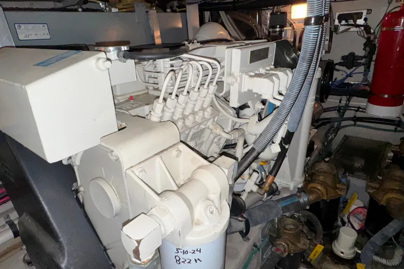  Yacht Photos Pics Engine room of a 2004 Sea Ray 390 Motor Yacht, showcasing mechanical components.