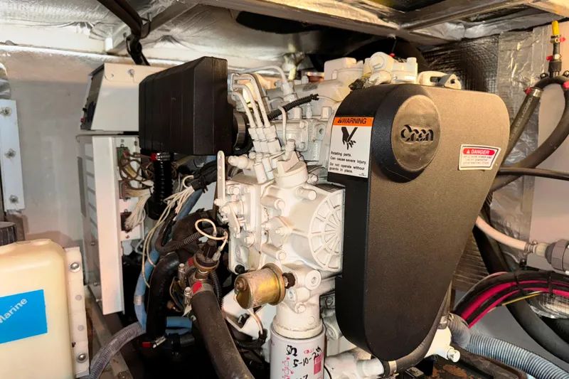  Yacht Photos Pics Engine room of 2004 Sea Ray 390 Motor Yacht with mechanical components and wiring.