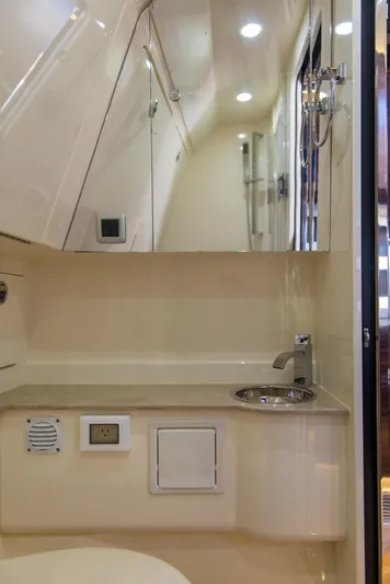  Yacht Photos Pics 2017 Scout 420 LXF boat interior with modern bathroom fixtures and sleek design.