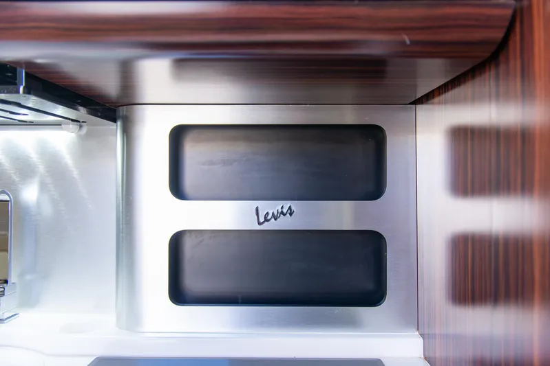  Yacht Photos Pics Interior detail of 2017 Scout 420 LXF boat, featuring sleek wood and metal finishes.