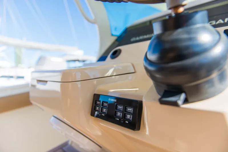  Yacht Photos Pics Control panel of a 2017 Scout 420 LXF boat, featuring modern navigation equipment.