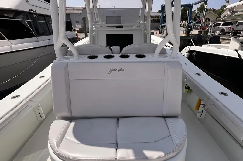  Yacht Photos Pics 2020 Yellowfin 36 boat interior with white seating and cup holders.