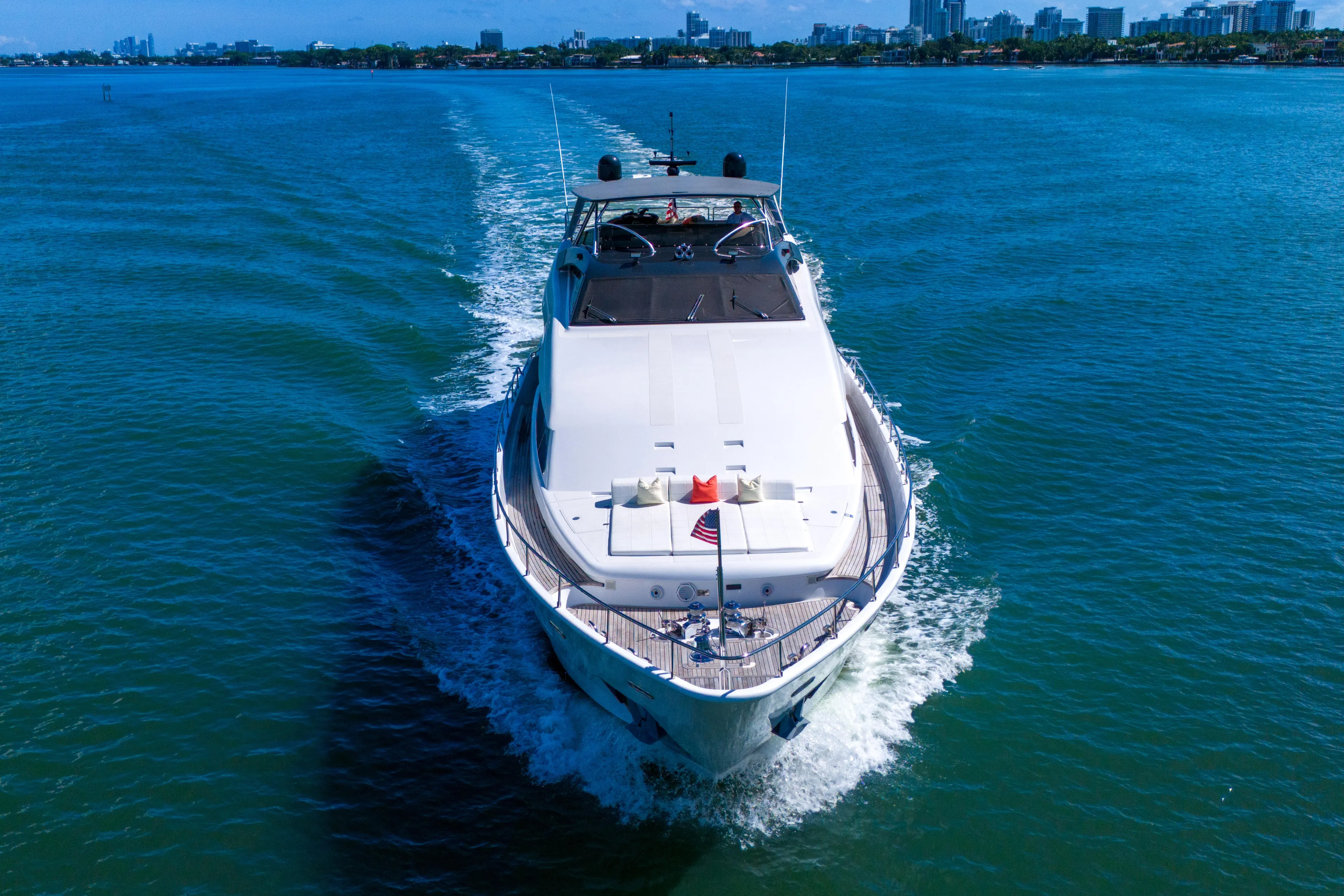 Sinpatico Yacht Photos Pics Luxury 2002 Ferretti Yachts Custom Line 94 cruising on blue waters.