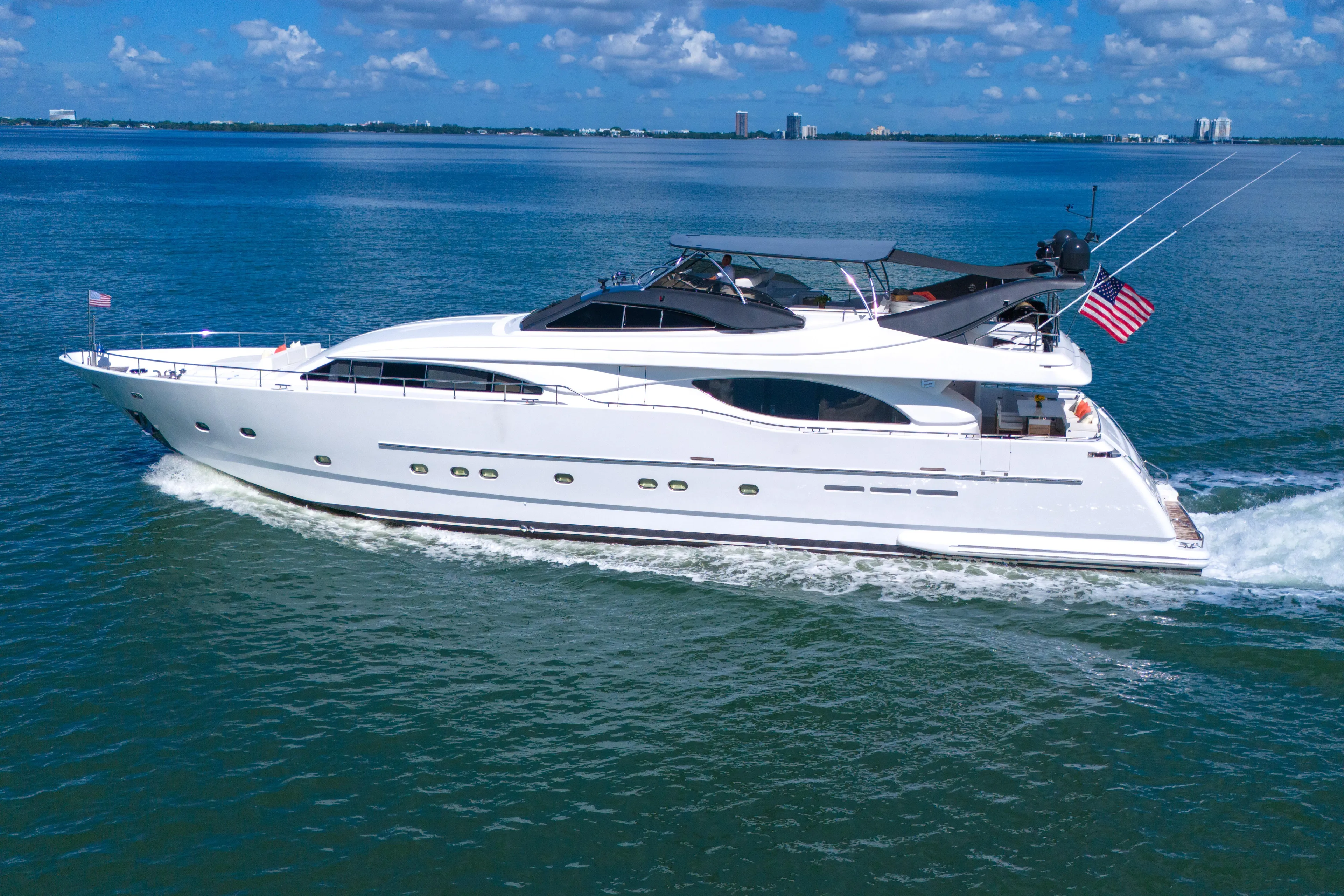 Sinpatico Yacht Photos Pics Luxury Ferretti Yachts Custom Line 94 cruising on open water, 2002 model.