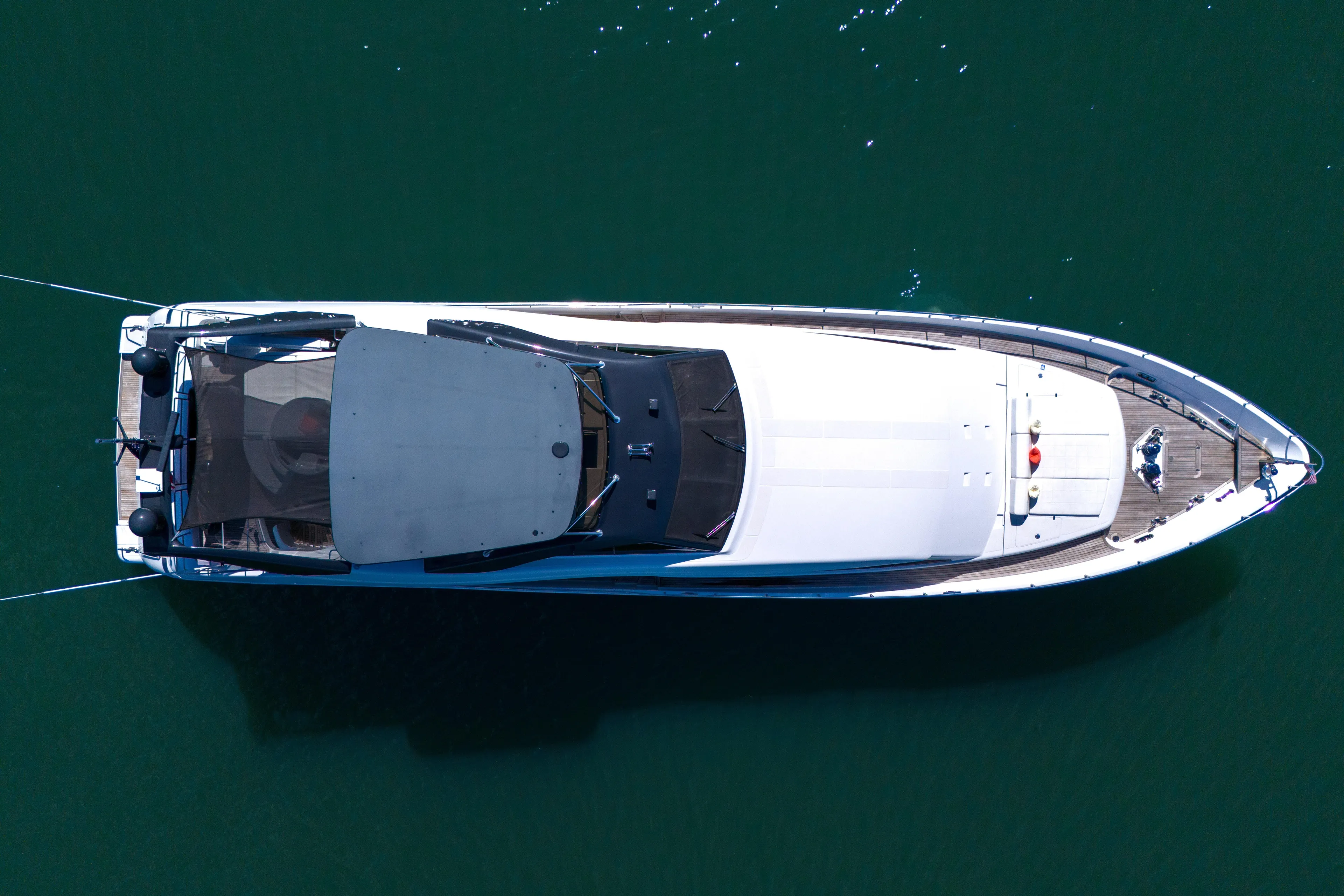 Sinpatico Yacht Photos Pics Aerial view of 2002 Ferretti Yachts Custom Line 94 on calm water.