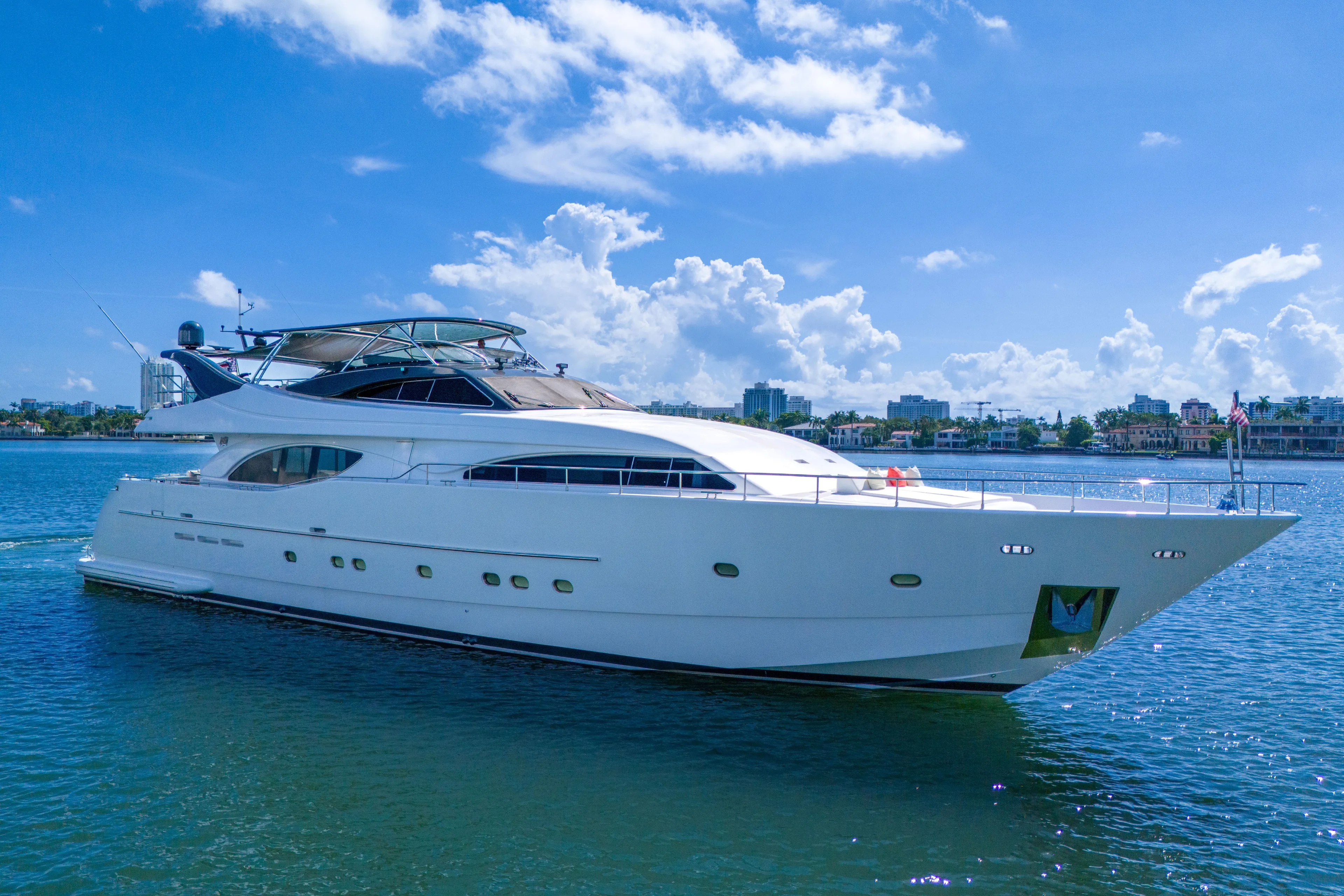 Sinpatico Yacht Photos Pics Ferretti Yachts Custom Line 94, 2002 model, cruising on a sunny day.