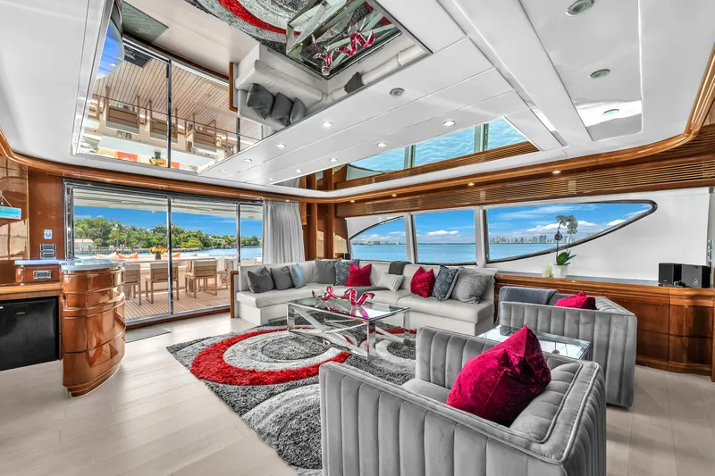 Sinpatico Yacht Photos Pics Luxurious interior of 2002 Ferretti Yachts Custom Line 94 with elegant seating and panoramic views.