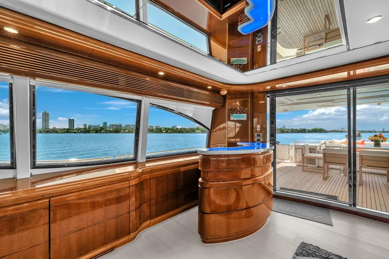 Sinpatico Yacht Photos Pics Luxurious interior of 2002 Ferretti Yachts Custom Line 94 with stunning ocean view.