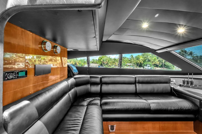 Sinpatico Yacht Photos Pics Luxurious interior of 2002 Ferretti Yachts Custom Line 94 with black leather seating.