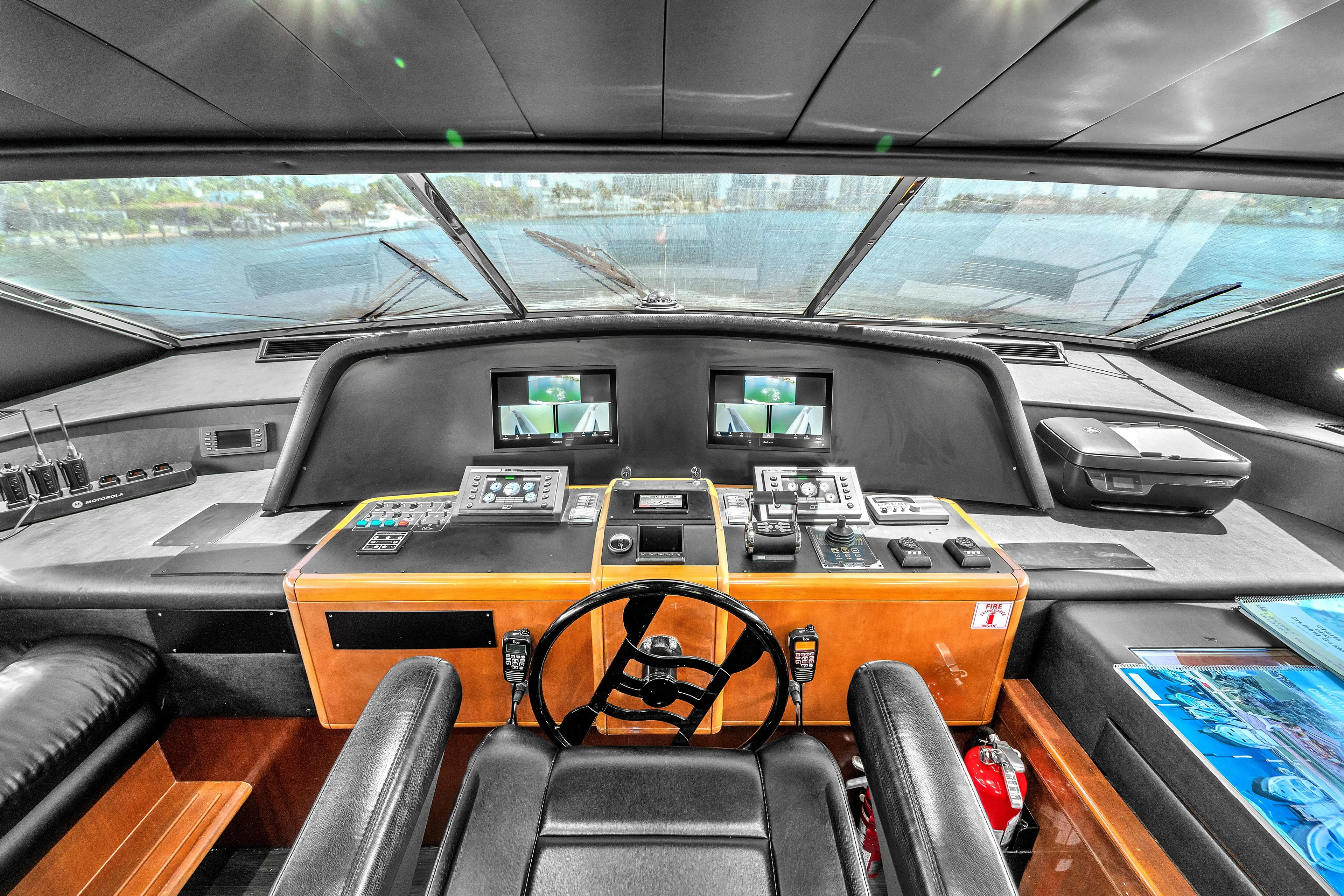 Sinpatico Yacht Photos Pics Cockpit of 2002 Ferretti Yachts Custom Line 94 with navigation controls and panoramic view.