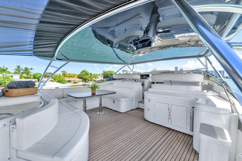 Sinpatico Yacht Photos Pics Luxurious 2002 Ferretti Yachts Custom Line 94 with spacious deck and elegant seating area.