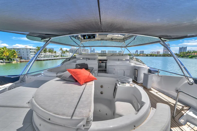 Sinpatico Yacht Photos Pics Luxurious 2002 Ferretti Yachts Custom Line 94 with spacious deck and scenic waterfront view.