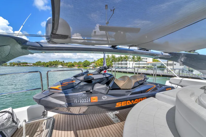 Sinpatico Yacht Photos Pics Luxury yacht deck with jet ski, Ferretti Yachts Custom Line 94, 2002 model.