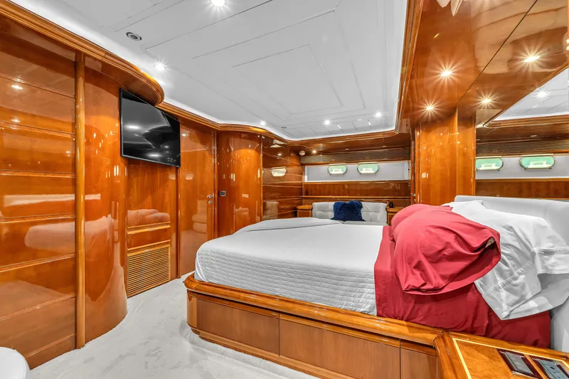 Sinpatico Yacht Photos Pics Luxurious 2002 Ferretti Yachts Custom Line 94 bedroom with elegant wood paneling and modern amenities.