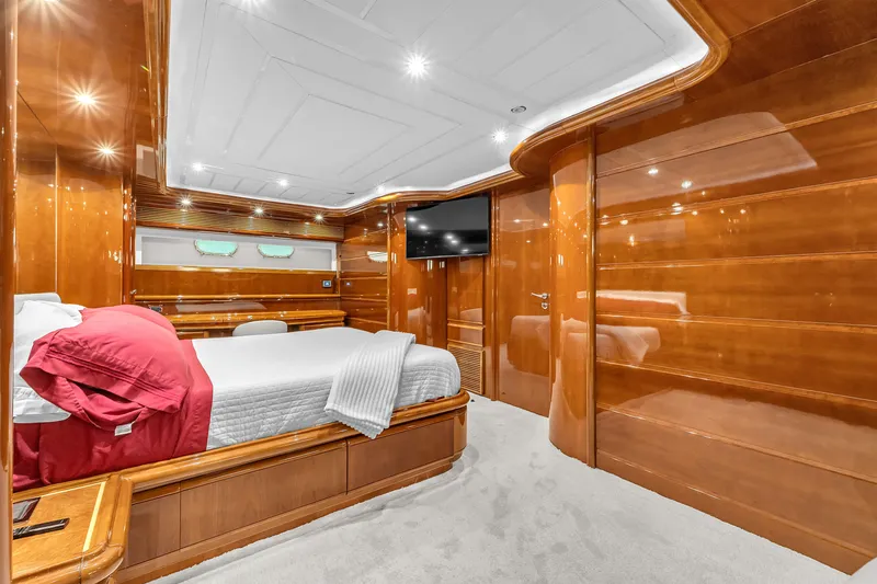 Sinpatico Yacht Photos Pics Luxurious 2002 Ferretti Yachts Custom Line 94 bedroom with polished wood and modern amenities.