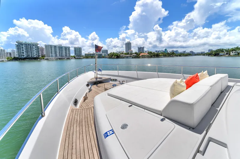 Sinpatico Yacht Photos Pics Luxurious 2002 Ferretti Yachts Custom Line 94 on scenic waterfront with city skyline.