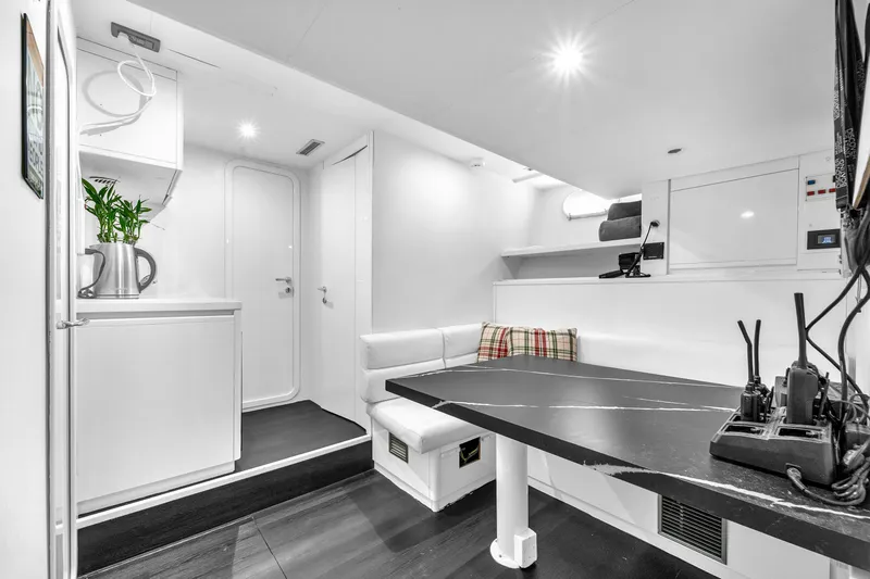 Sinpatico Yacht Photos Pics Luxurious interior of 2002 Ferretti Yachts Custom Line 94, featuring modern seating and sleek design.