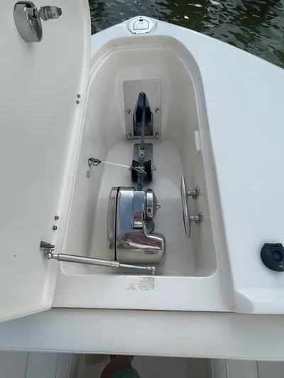  Yacht Photos Pics Anchor compartment of 2017 Grady-White Freedom 285 boat, featuring a stainless steel windlass.