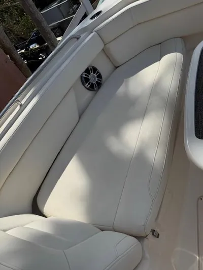  Yacht Photos Pics 2017 Grady-White Freedom 285 boat interior with white cushioned seating.