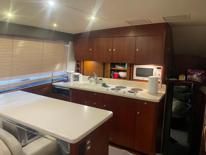  Yacht Photos Pics Interior of 1996 Ocean Yachts 53 Supersport with modern kitchen.