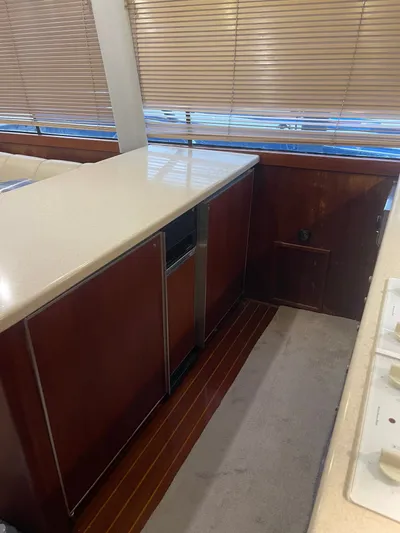  Yacht Photos Pics Interior of 1996 Ocean Yachts 53 Supersport with wooden cabinetry.