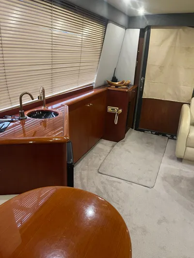  Yacht Photos Pics Interior of 1996 Ocean Yachts 53 Supersport with wooden furnishings.