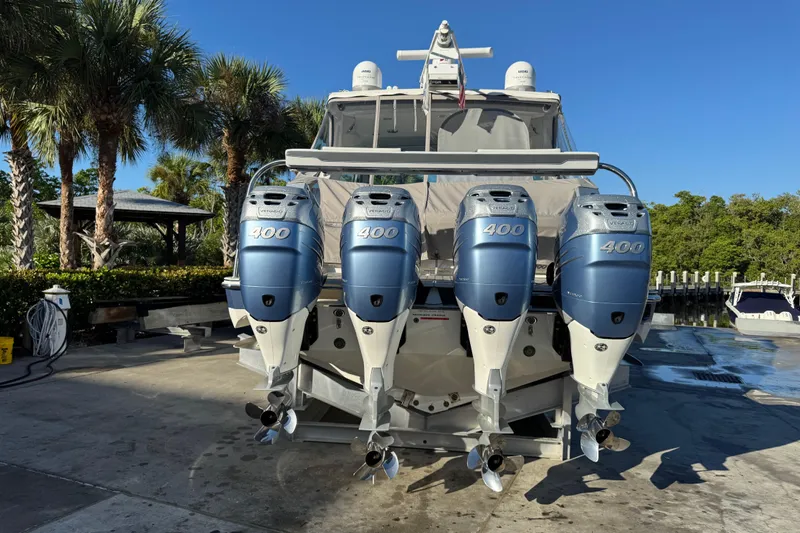 Millennium Falcon Yacht Photos Pics 2023 Formula 400 Super Sport Crossover with four powerful outboard engines docked.