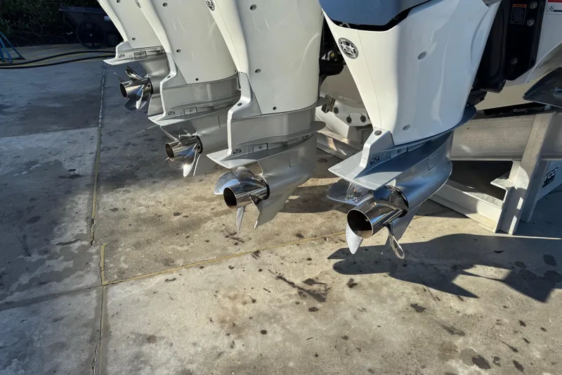 Millennium Falcon Yacht Photos Pics Outboard engines of a 2023 Formula 400 Super Sport Crossover on a concrete surface.