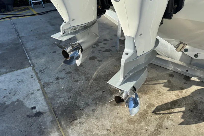 Millennium Falcon Yacht Photos Pics Outboard motors of 2023 Formula 400 Super Sport Crossover on a concrete surface.