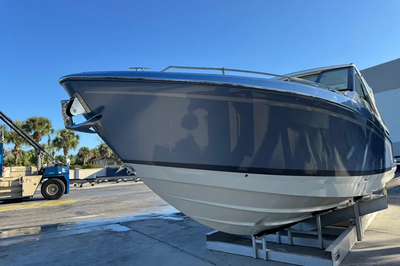 Millennium Falcon Yacht Photos Pics 2023 Formula 400 Super Sport Crossover boat on display under clear blue sky.