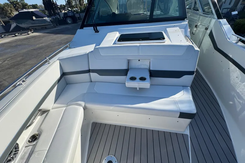 Millennium Falcon Yacht Photos Pics 2023 Formula 400 Super Sport Crossover boat interior with sleek seating and cup holders.