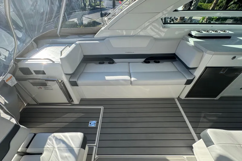 Millennium Falcon Yacht Photos Pics 2023 Formula 400 Super Sport Crossover interior with sleek seating and modern design.