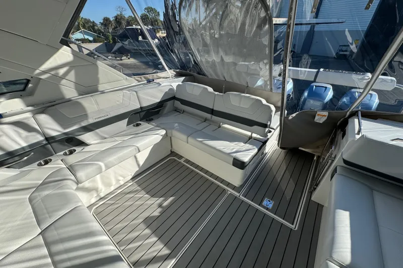 Millennium Falcon Yacht Photos Pics 2023 Formula 400 Super Sport Crossover boat interior with luxurious seating and modern design.