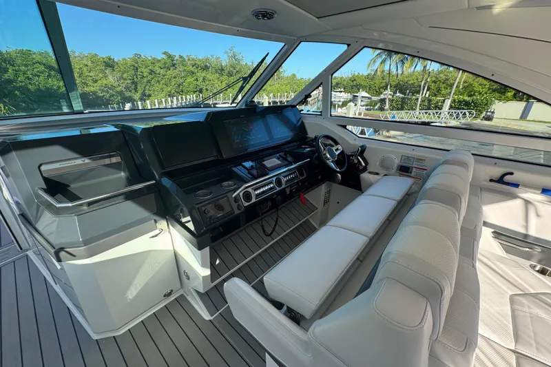 Millennium Falcon Yacht Photos Pics 2023 Formula 400 Super Sport Crossover helm with modern controls and seating.