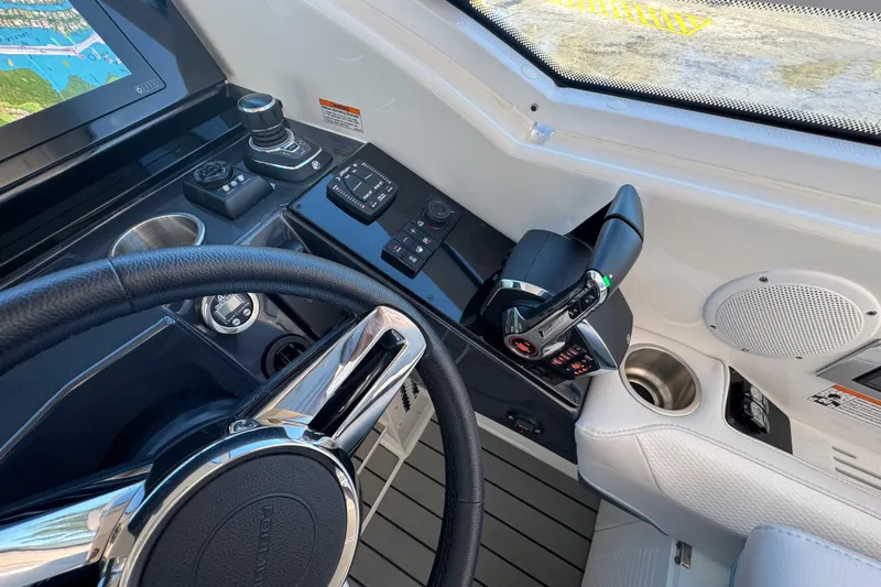 Millennium Falcon Yacht Photos Pics 2023 Formula 400 Super Sport Crossover helm with advanced controls and navigation display.