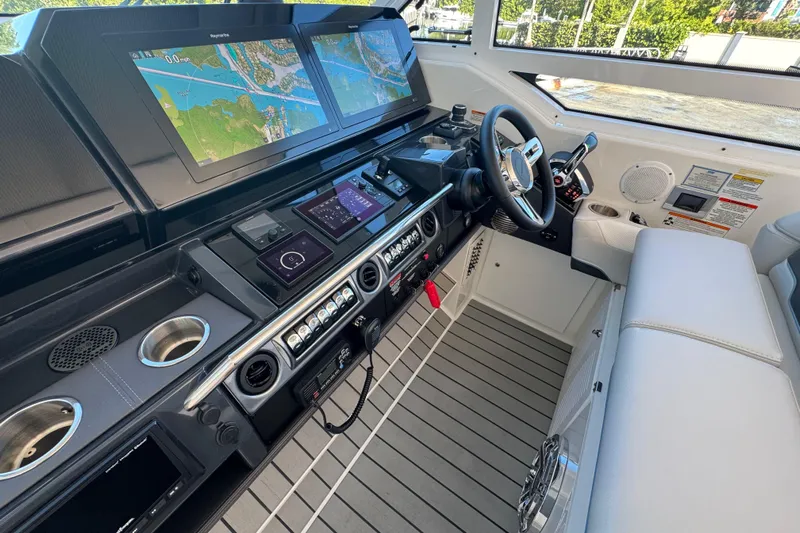 Millennium Falcon Yacht Photos Pics 2023 Formula 400 Super Sport Crossover helm with advanced navigation displays and luxurious seating.
