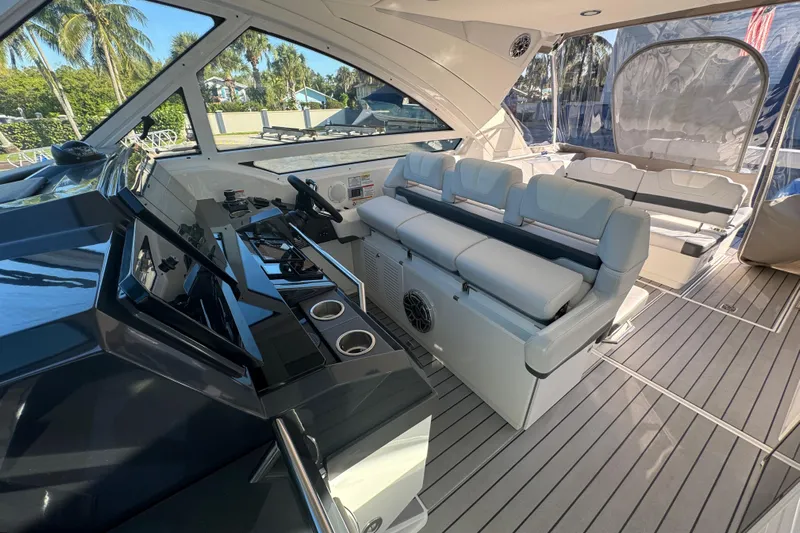 Millennium Falcon Yacht Photos Pics 2023 Formula 400 Super Sport Crossover yacht interior with luxurious seating and modern helm.