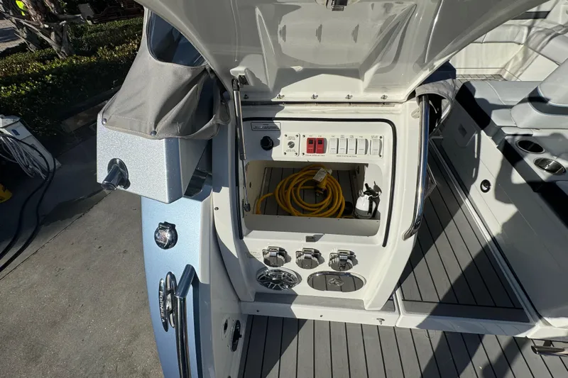 Millennium Falcon Yacht Photos Pics 2023 Formula 400 Super Sport Crossover boat electrical panel with storage compartment.